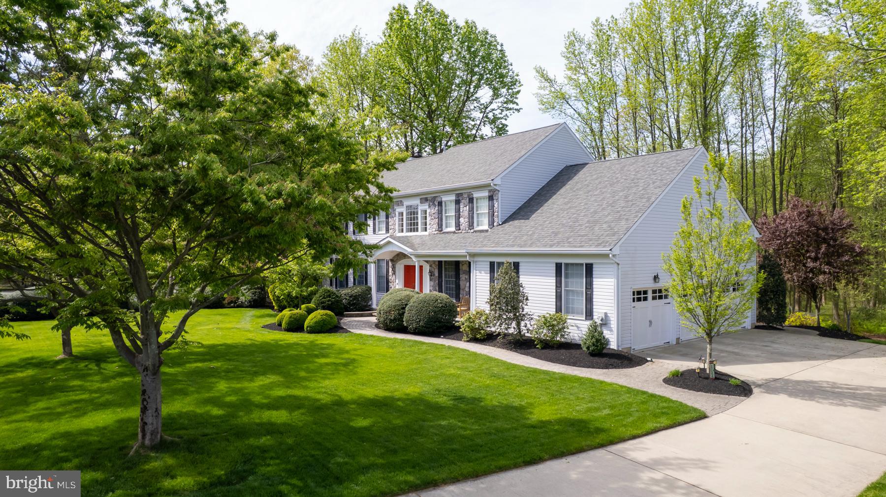 31 Millwood Drive Mickleton, NJ 08056 - Photo 3 of 62 a front view of house with yard and green space