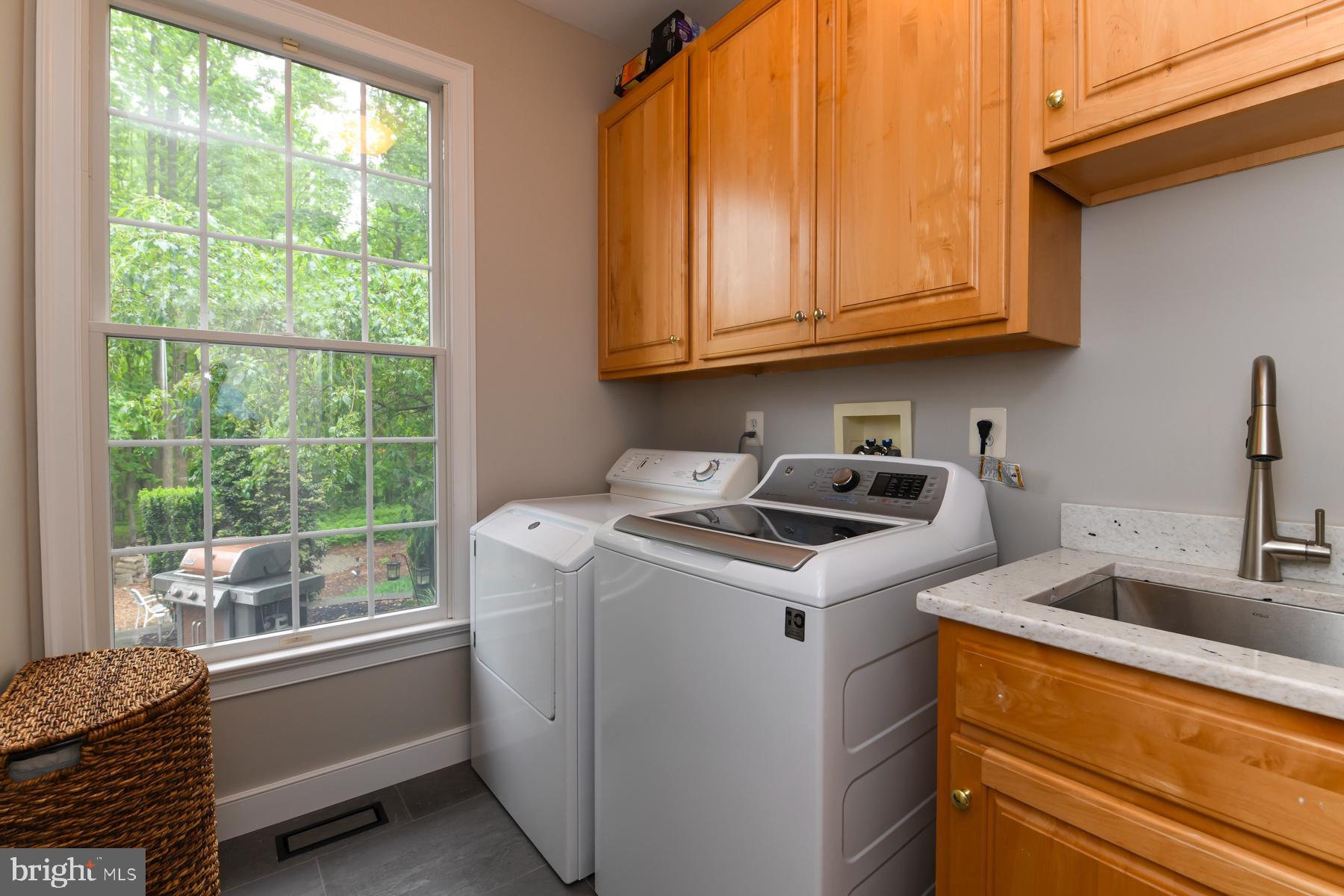 31 Millwood Drive Mickleton, NJ 08056 - Photo 33 of 62 a kitchen with a sink and cabinets