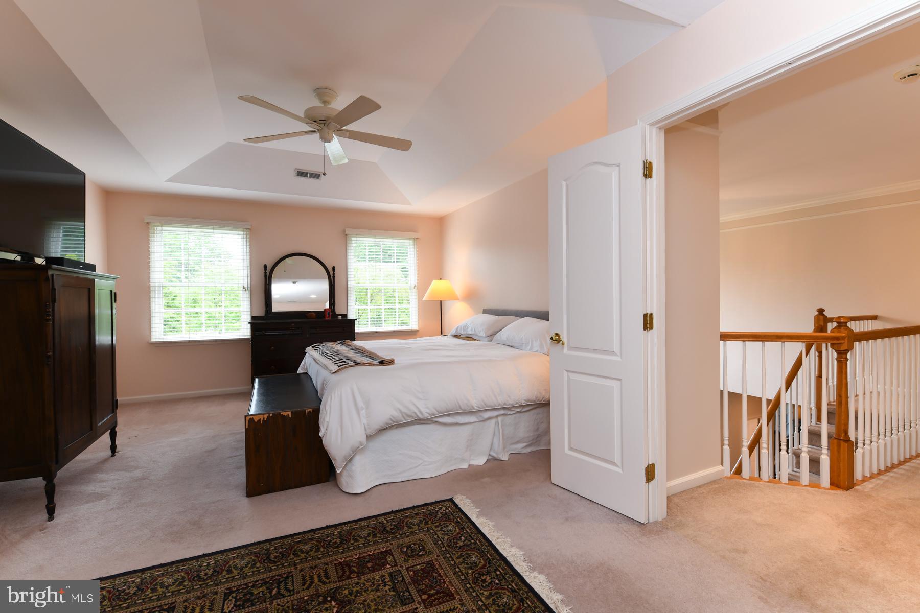 31 Millwood Drive Mickleton, NJ 08056 - Photo 38 of 62 a living room with a bed furniture and a large window
