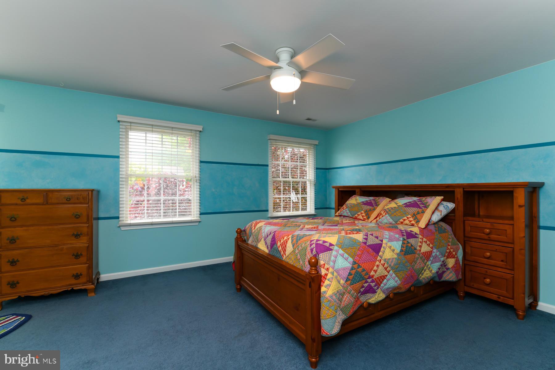31 Millwood Drive Mickleton, NJ 08056 - Photo 43 of 62 a bed sitting in a bedroom next to a window