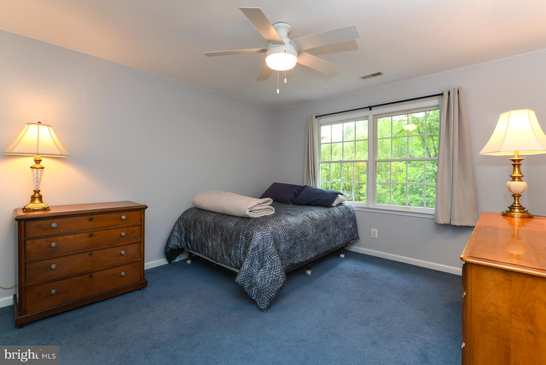 31 Millwood Drive Mickleton, NJ 08056 - Photo 45 of 62 a spacious bedroom with a bed dresser and a window