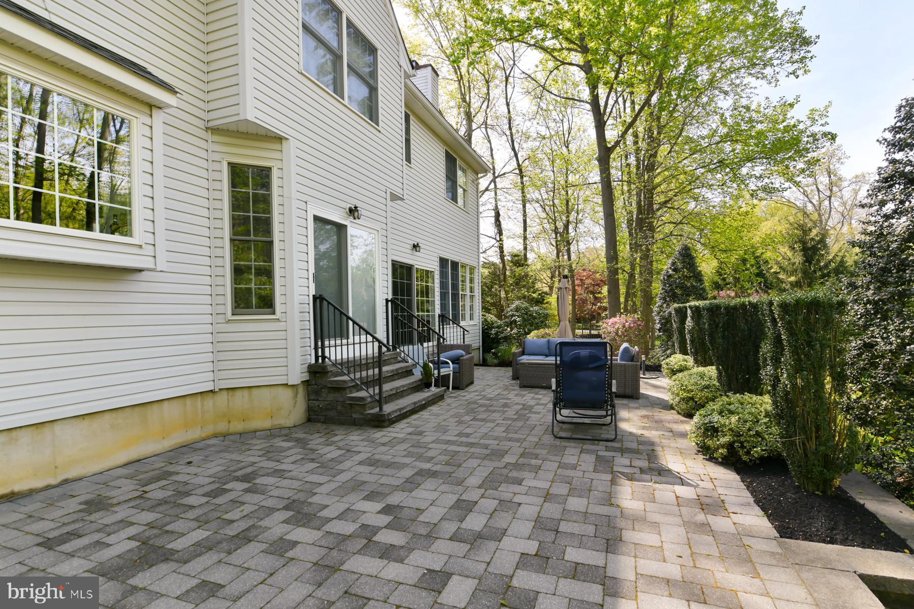 31 Millwood Drive Mickleton, NJ 08056 - Photo 49 of 62 a view of a patio with chairs and potted plants