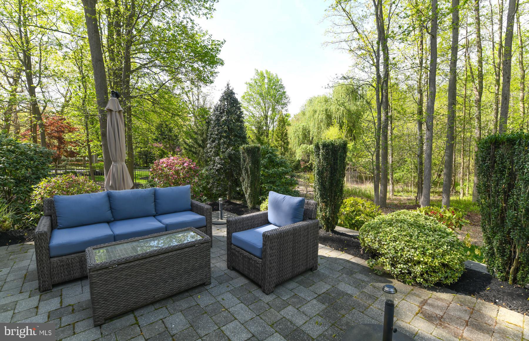 31 Millwood Drive Mickleton, NJ 08056 - Photo 50 of 62 a view of a patio with couches and plants