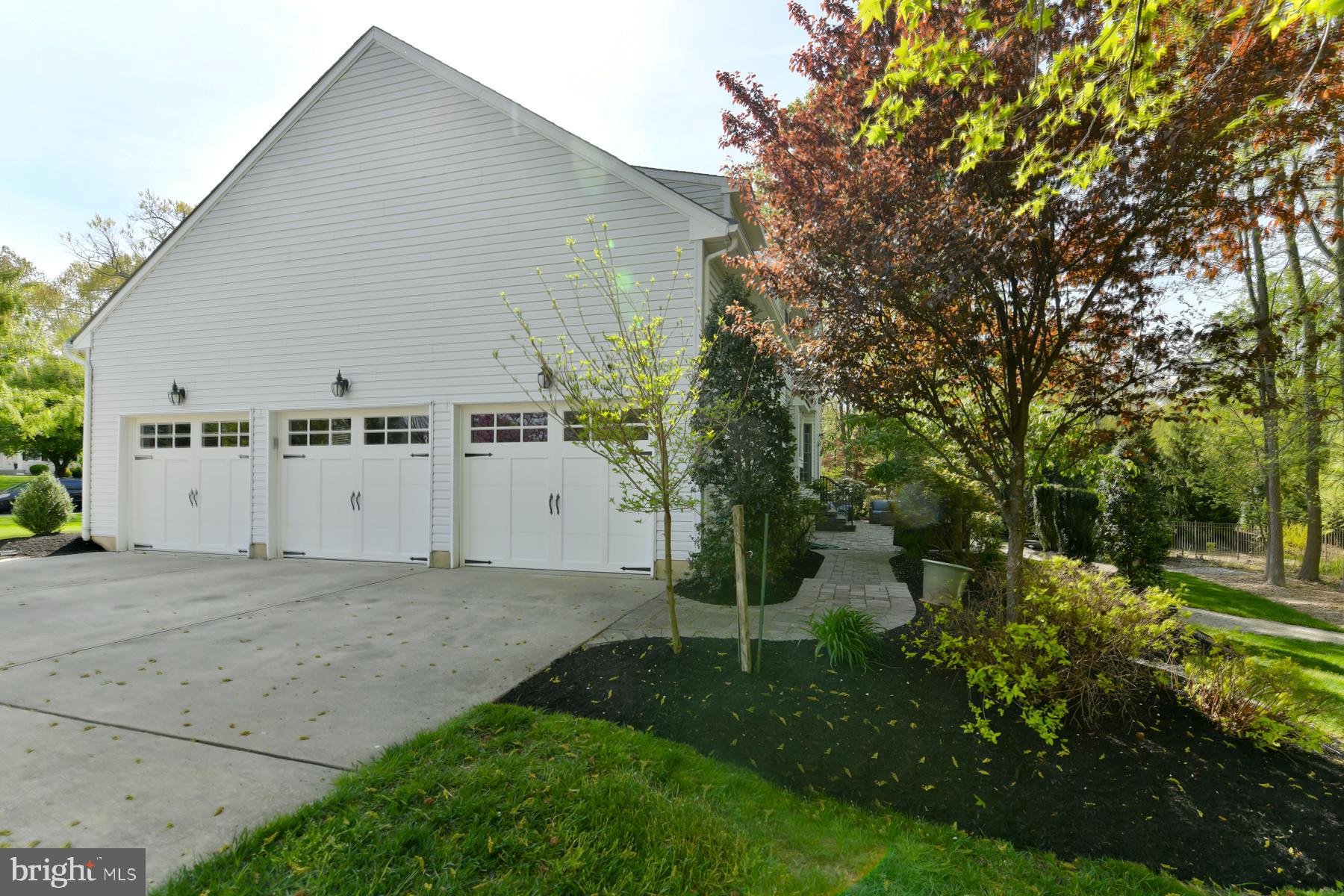 31 Millwood Drive Mickleton, NJ 08056 - Photo 9 of 62 front view of a house with a yard