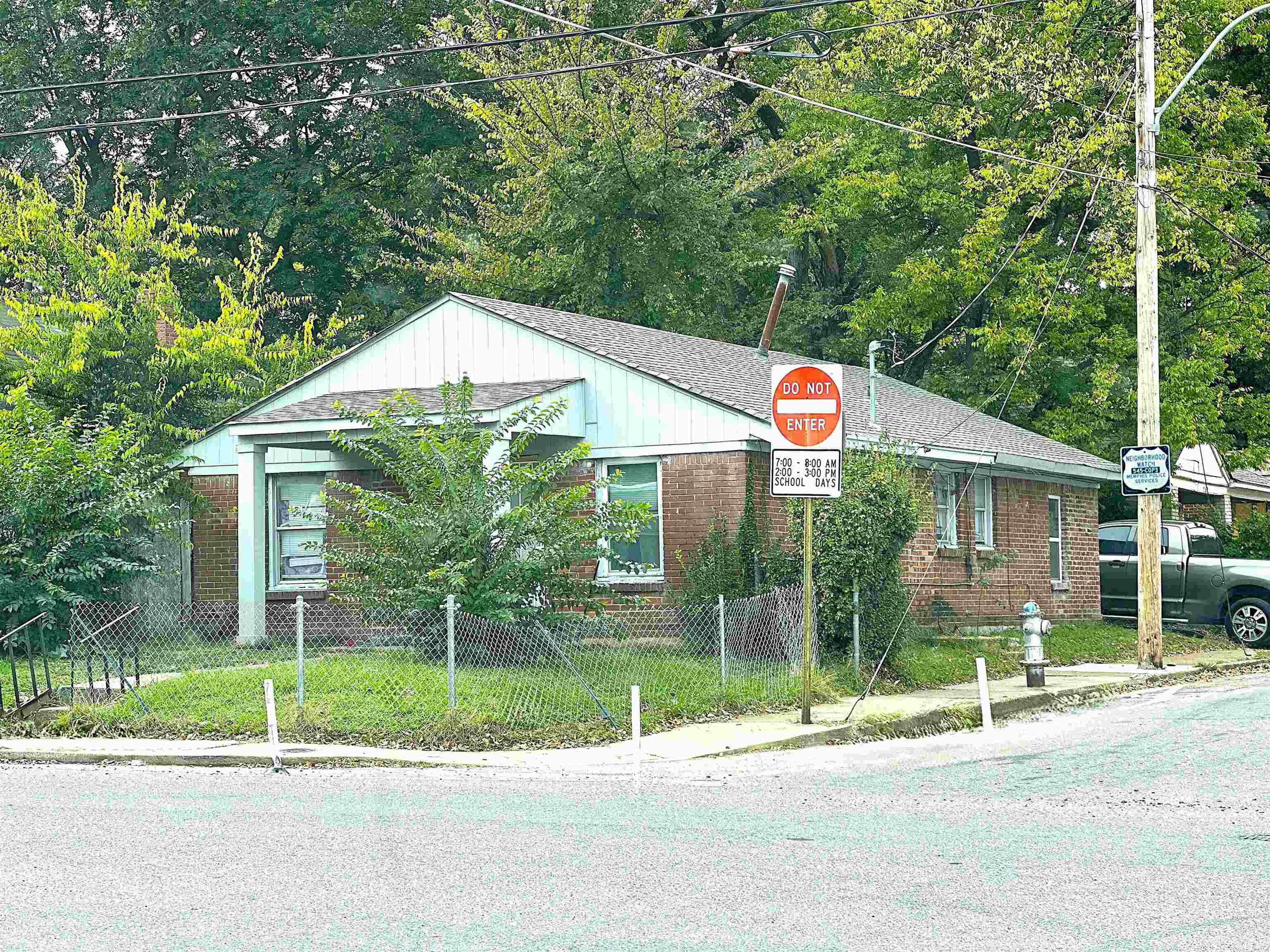 1103 Springdale Street Memphis, TN 38108 - Photo 1 of 2 a flag is sitting in front of a house