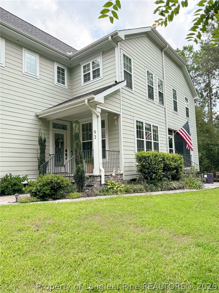 93 Falcon Ridge Drive Spring Lake, NC 28390 - Photo 45 of 50 a front view of a house with a yard