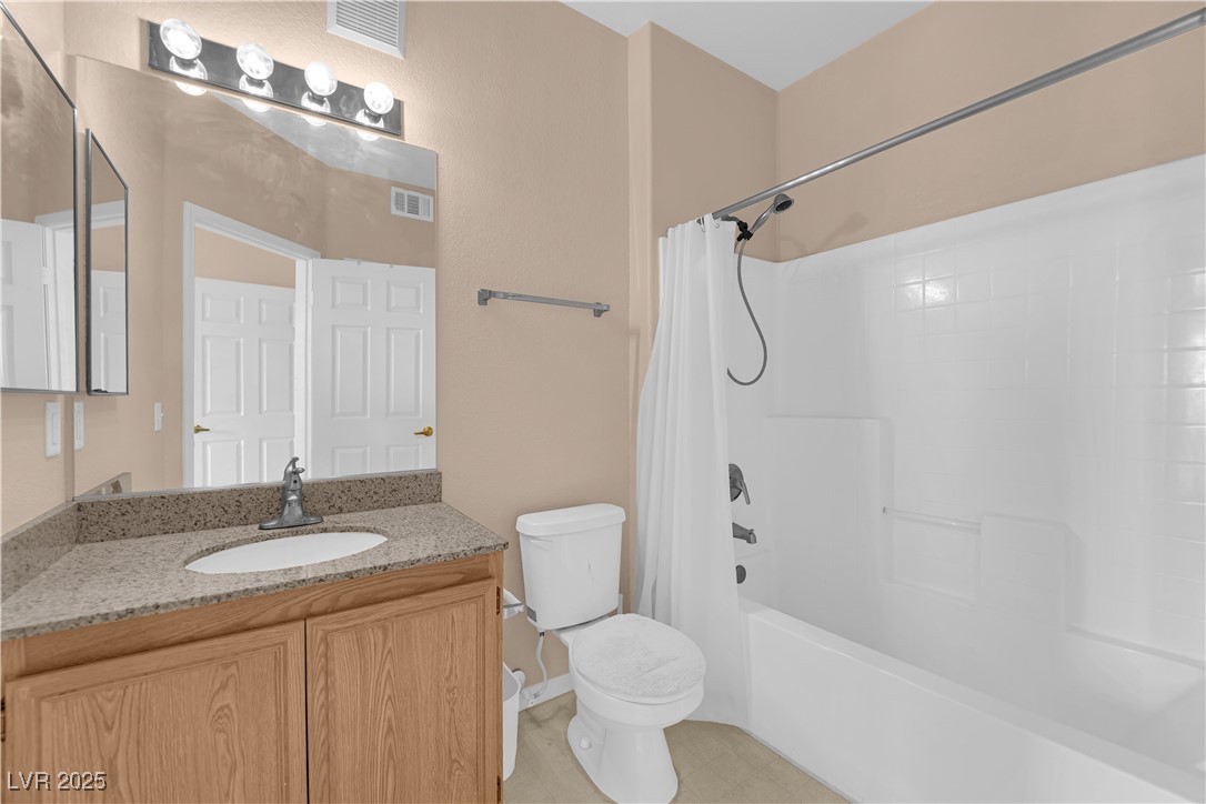 10550 West Alexander Road, Unit 2233 Las Vegas, NV 89129 - Photo 24 of 35 Full bathroom with shower / bath combo, toilet, visible vents, and vanity