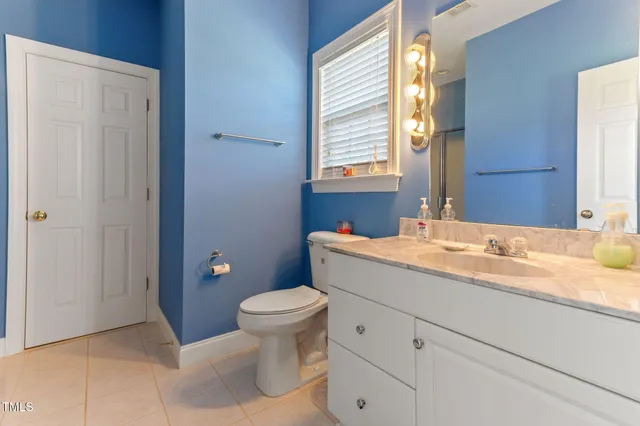 a room with furniture and a flat screen tv