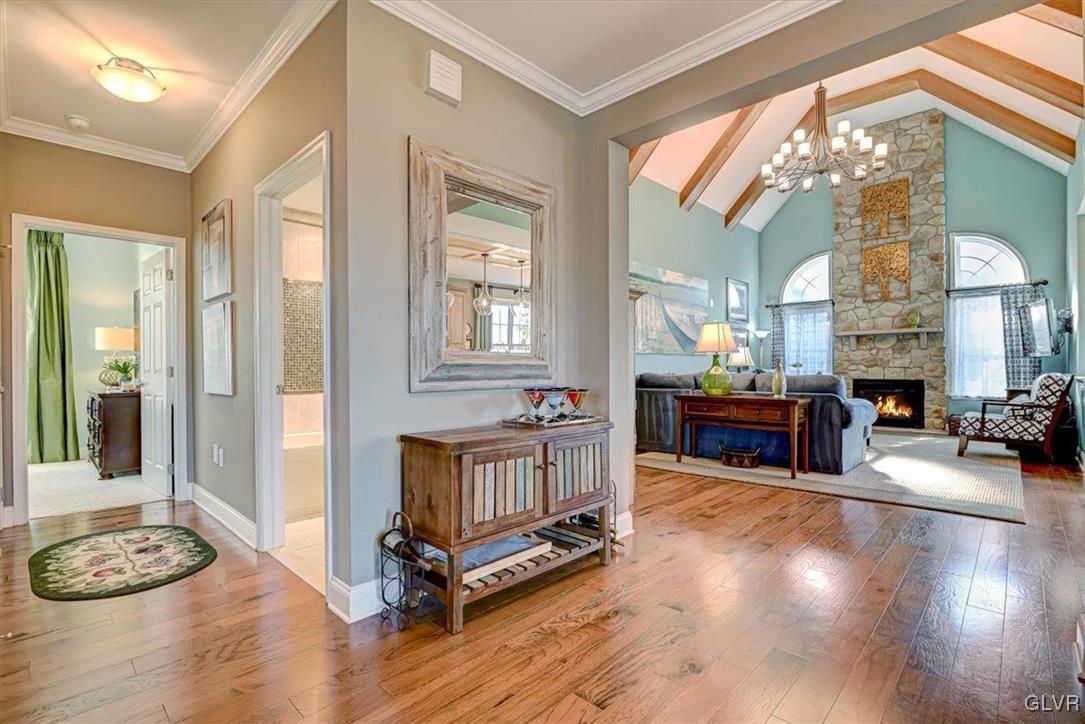 1039 Declaration Drive Bethlehem, PA 18017 - Photo 12 of 50 a living room with furniture a fireplace and a table