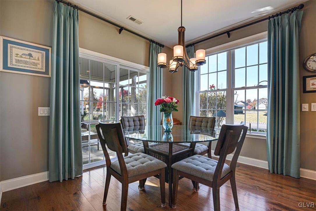 1039 Declaration Drive Bethlehem, PA 18017 - Photo 19 of 50 a dining room with furniture window and wooden floor