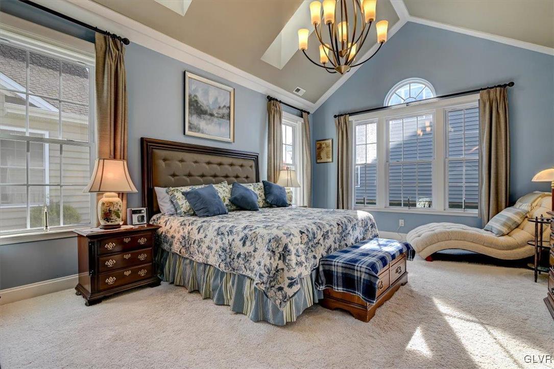 1039 Declaration Drive Bethlehem, PA 18017 - Photo 28 of 50 a bed sitting in a bedroom next to a window