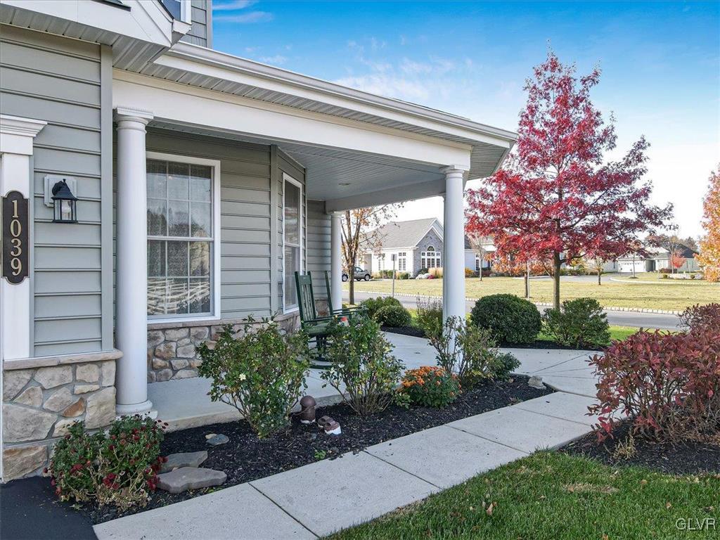 1039 Declaration Drive Bethlehem, PA 18017 - Photo 4 of 50 a front view of a house with garden
