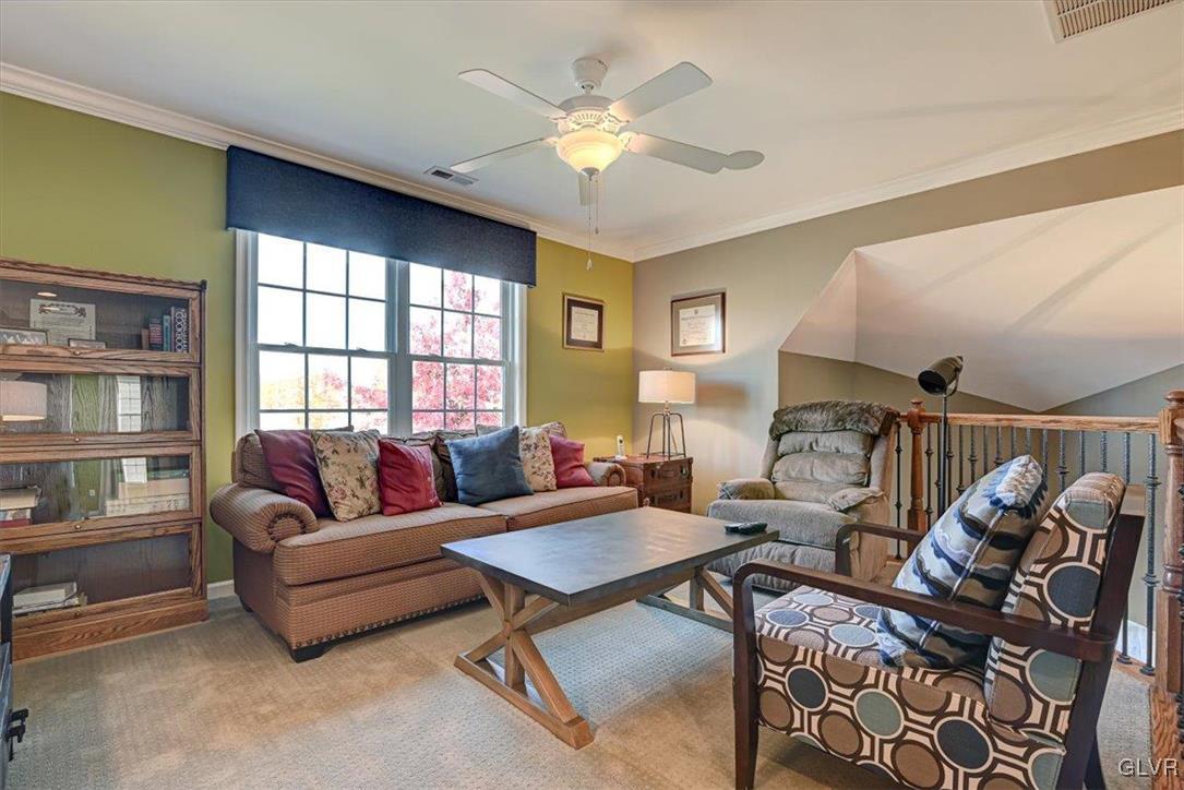 1039 Declaration Drive Bethlehem, PA 18017 - Photo 42 of 50 a living room with furniture and a large window