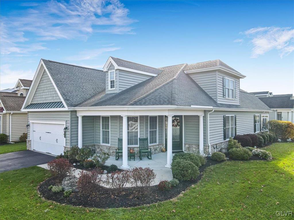 1039 Declaration Drive Bethlehem, PA 18017 - Photo 5 of 50 a front view of a house with garden