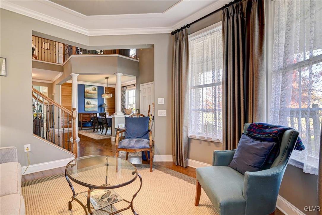 1039 Declaration Drive Bethlehem, PA 18017 - Photo 9 of 50 a living room with furniture fireplace and a large window