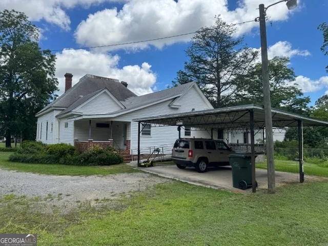 a car parked in front of a house