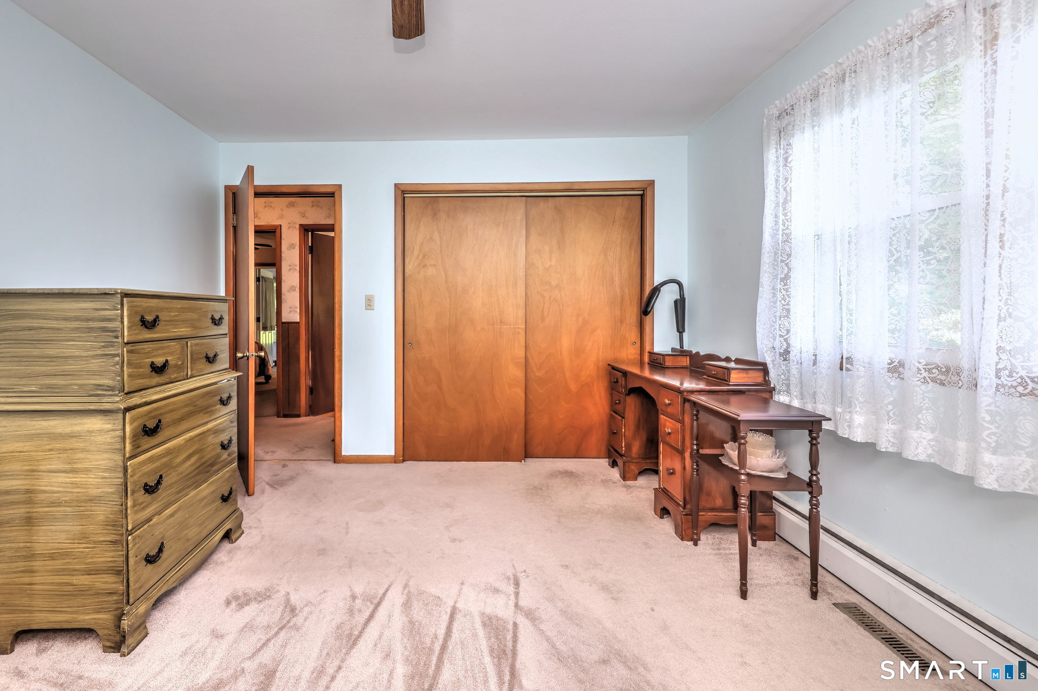 212 Swain Avenue Meriden, CT 06450 - Photo 24 of 38 a bed room with a bed and a chair