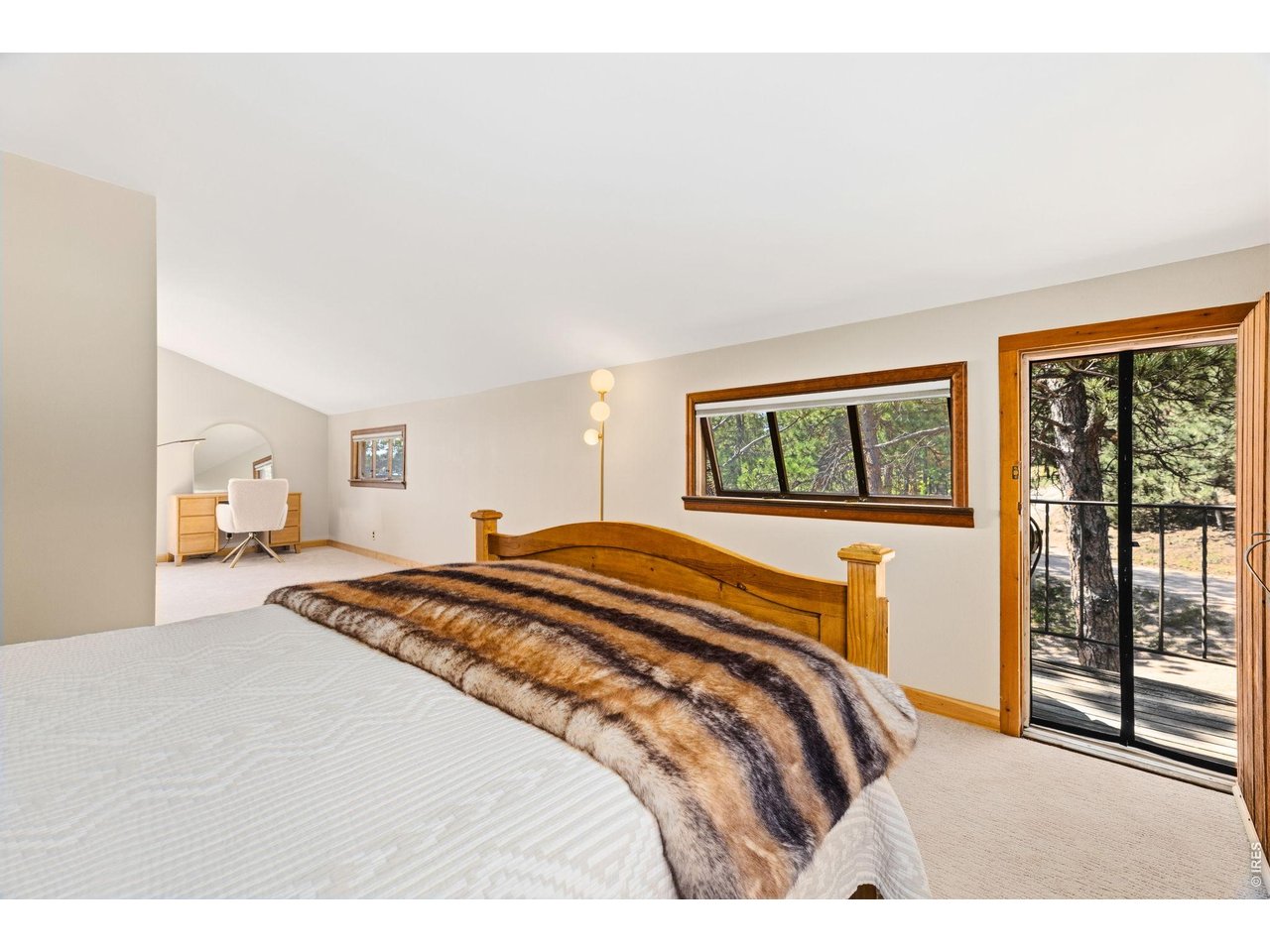128 Elk Road Lyons, CO 80540 - Photo 26 of 50 Upstairs oversized bedroom with access to bacony
