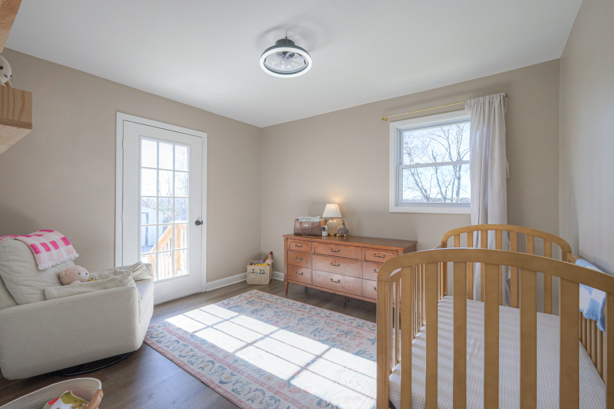 7 Roberts Lane Lebanon, TN 37087 - Photo 17 of 38 a bedroom with a bed and wooden floor
