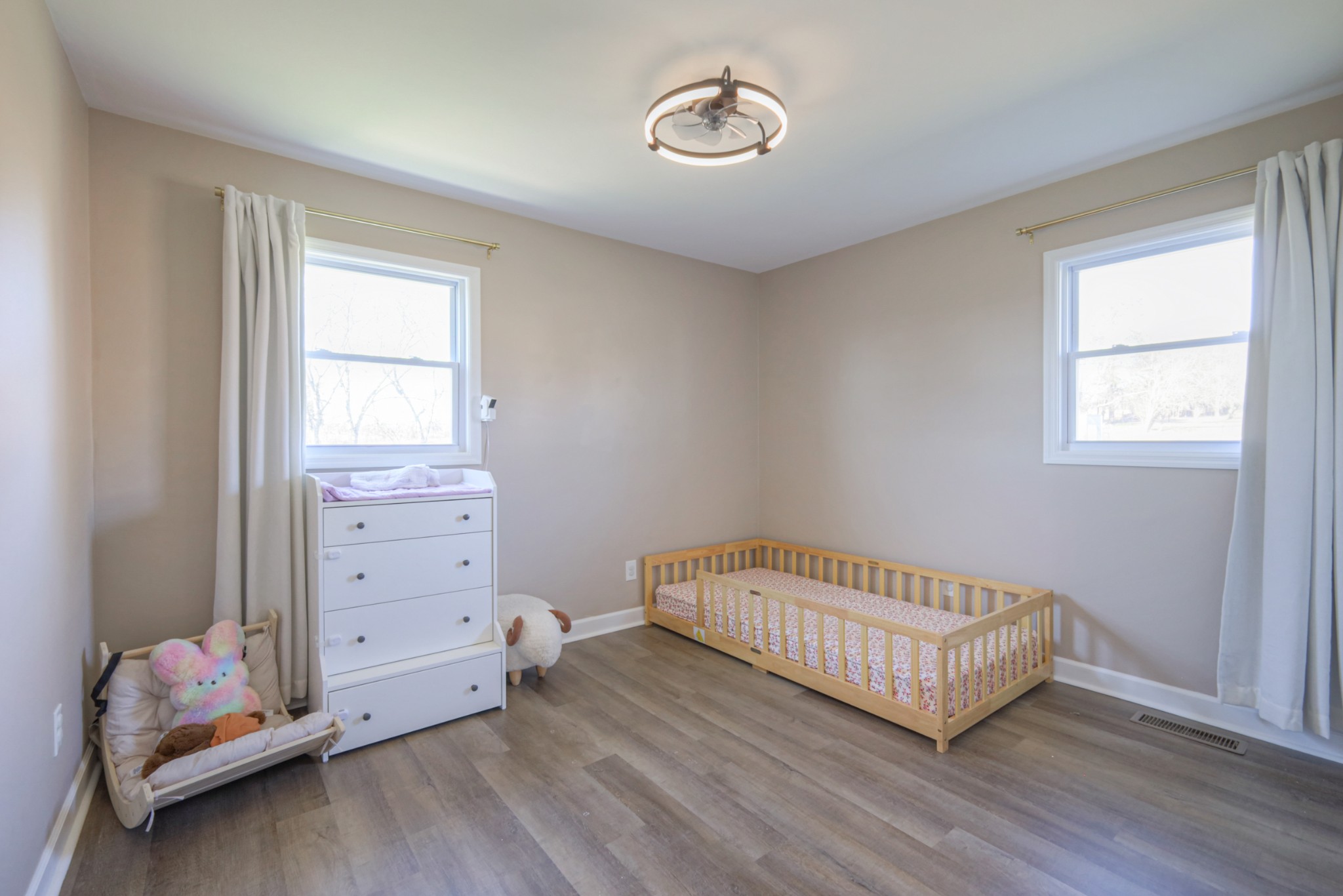 7 Roberts Lane Lebanon, TN 37087 - Photo 19 of 38 a room with a baby crib and a window