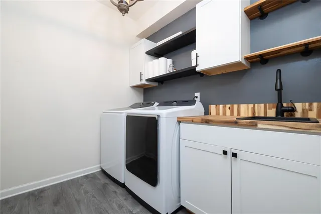 a utility room with dryer and washer
