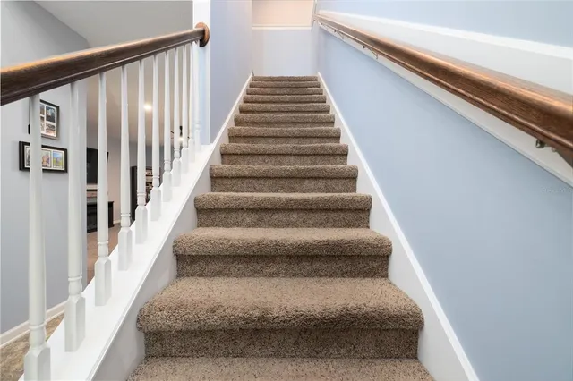 a view of room with window and hardwood floor