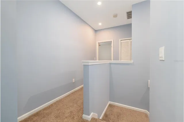 a bedroom with a bed dresser and a window