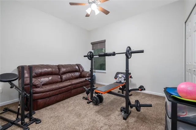 a bedroom with a bed and a cabinets
