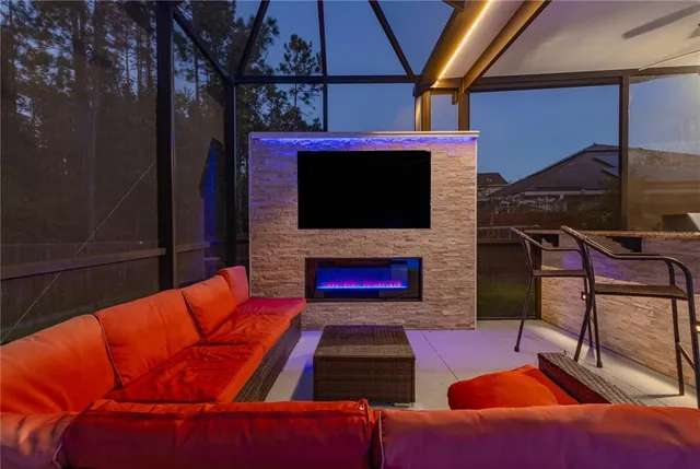 a view of swimming pool with a patio