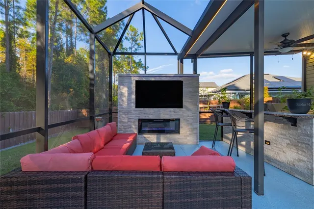 a view of a swimming pool with a patio