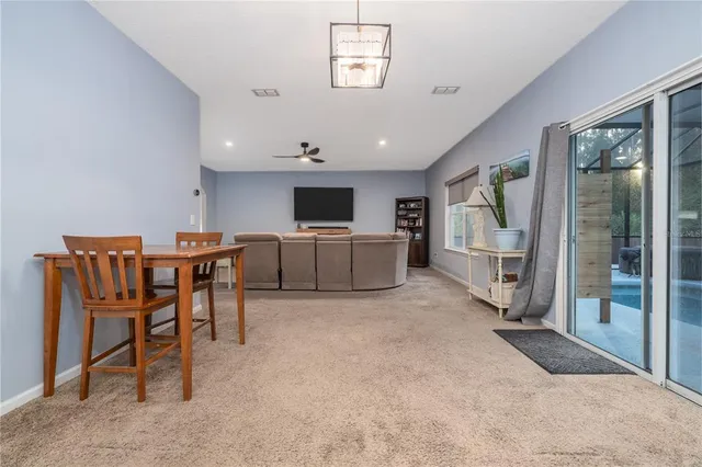 a view of a workspace with furniture and a livingroom