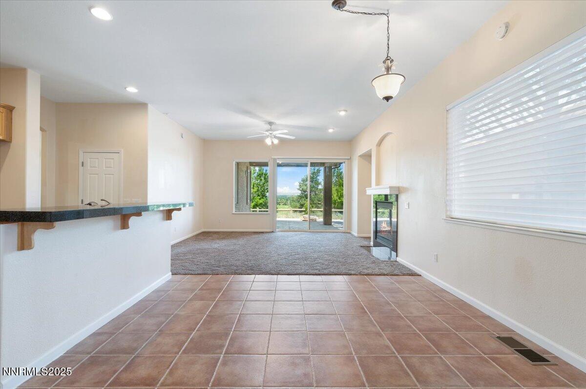 2720 Albazano Drive Sparks, NV 89436 - Photo 12 of 47 a view of a livingroom with furniture window and wooden floor