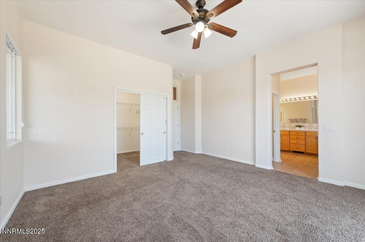 2720 Albazano Drive Sparks, NV 89436 - Photo 24 of 47 a view of a room with a ceiling fan