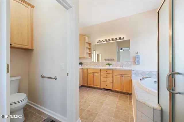 a bathroom with a bathtub and a sink