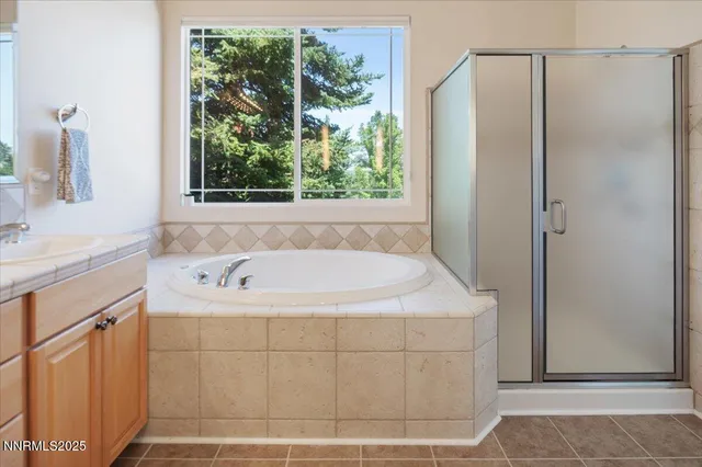 a white bath tub sitting in a bathroom