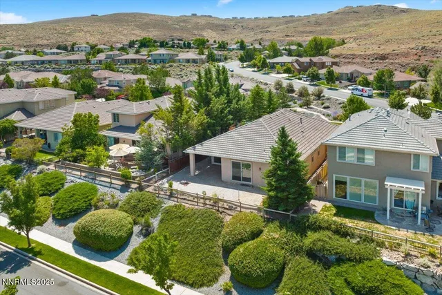 a view of a swimming pool with a yard