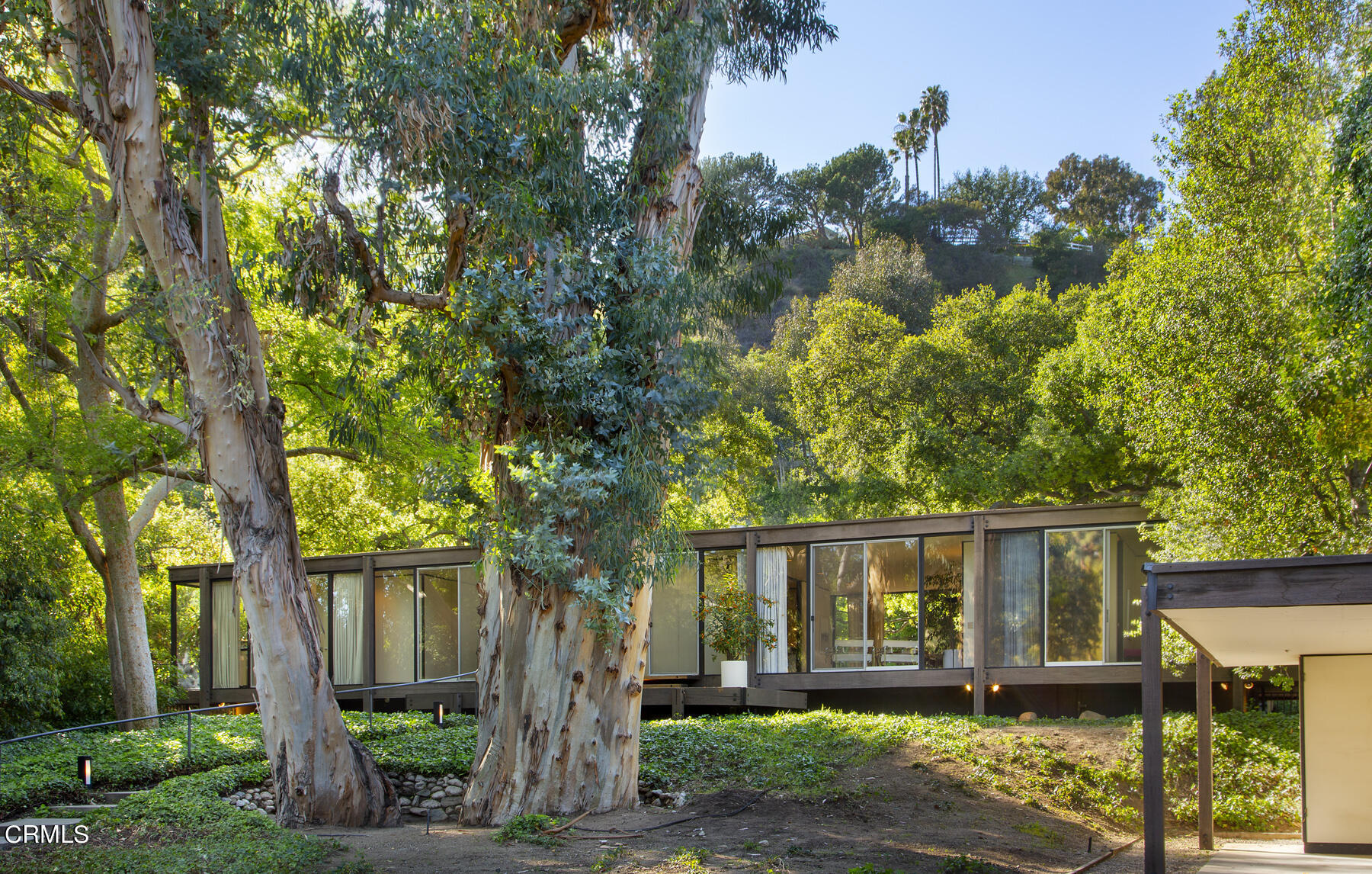 215 La Vereda Road Pasadena, CA 91105 - Photo 23 of 26 a front view of a house with garden