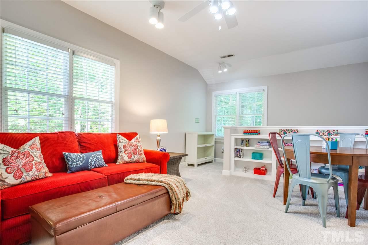 9401 Gabe Court Raleigh, NC 27613 - Photo 14 of 25 Bonus space features a separate back staircase and is perfect for a game room or entertaining space!