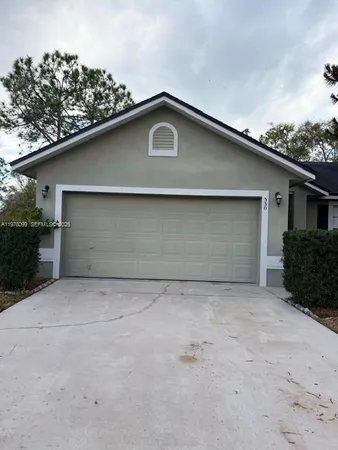 a view of backyard of house