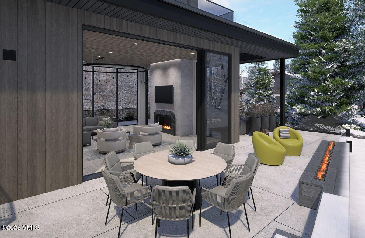 296 Rockledge Road Vail, CO 81657 - Photo 13 of 63 a table and chairs in patio of the house