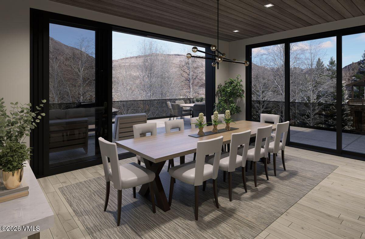 296 Rockledge Road Vail, CO 81657 - Photo 25 of 63 a view of a dining room with furniture window and outside view