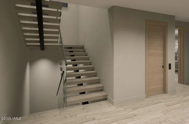 a bathroom with a tub sink a toilet and mirror