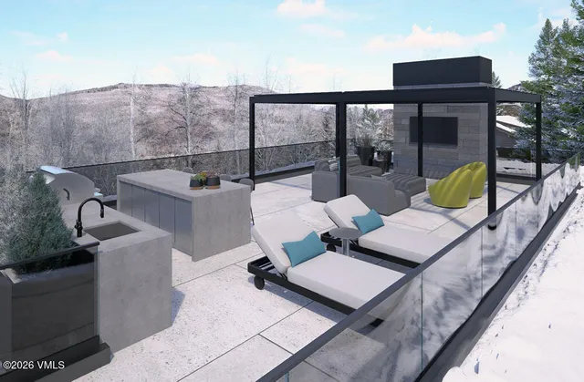 a kitchen with a sink cabinets and wooden floor