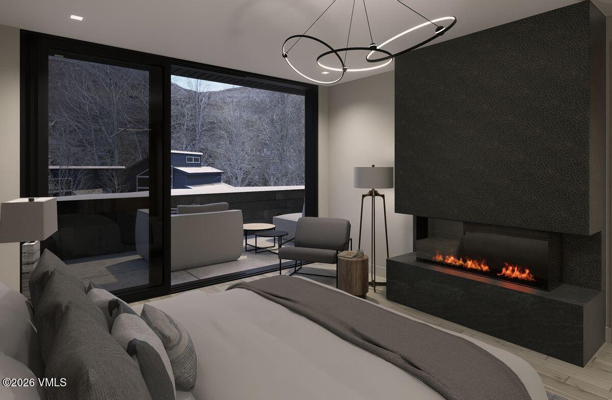 296 Rockledge Road Vail, CO 81657 - Photo 35 of 63 a bedroom with bed and window