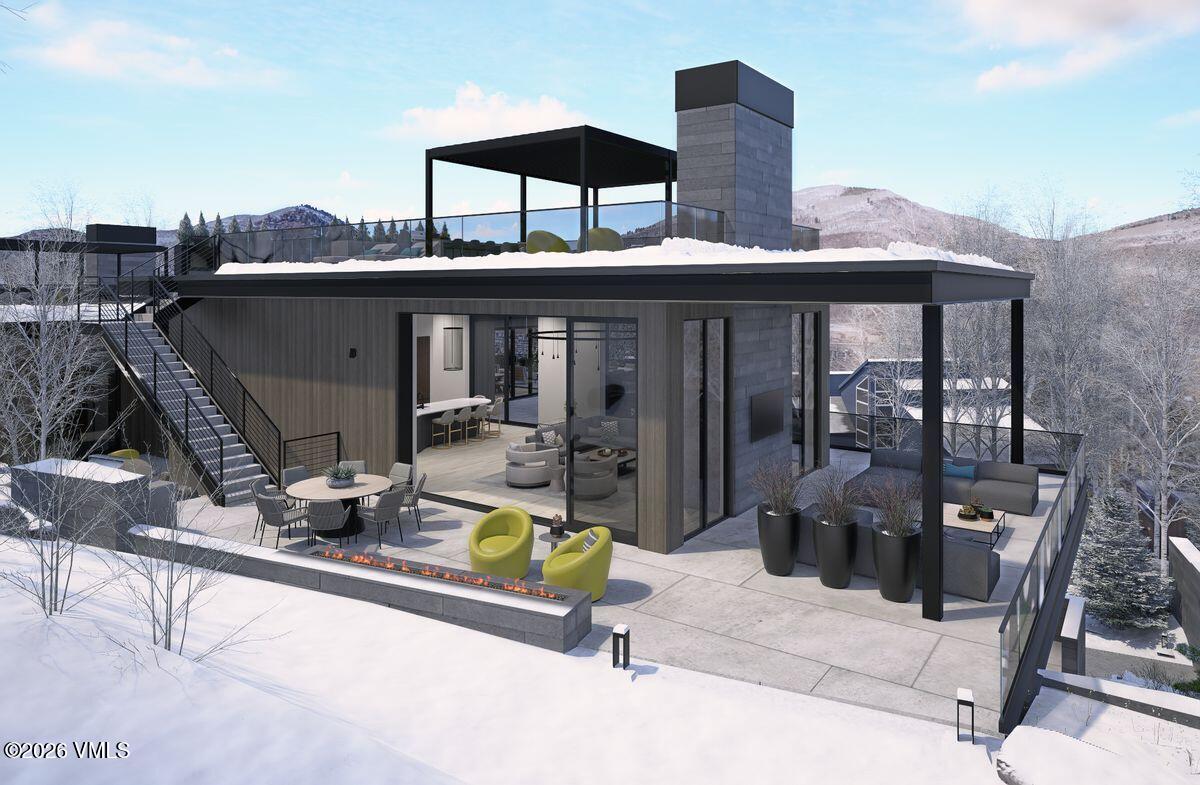 296 Rockledge Road Vail, CO 81657 - Photo 4 of 63 a view of a chairs and tables in patio