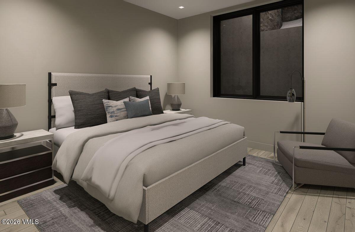 296 Rockledge Road Vail, CO 81657 - Photo 41 of 63 a bedroom with a bed and a couch