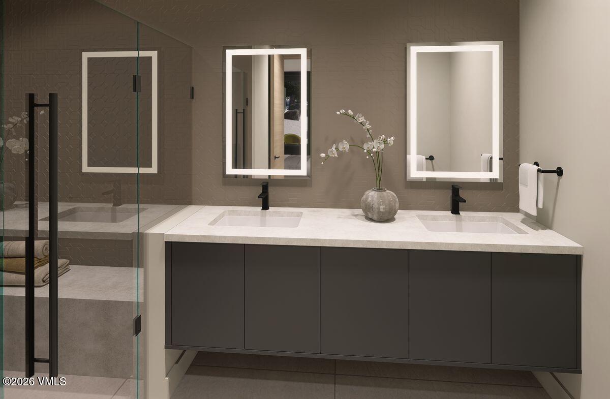 296 Rockledge Road Vail, CO 81657 - Photo 46 of 63 a bathroom with a sink and a mirror