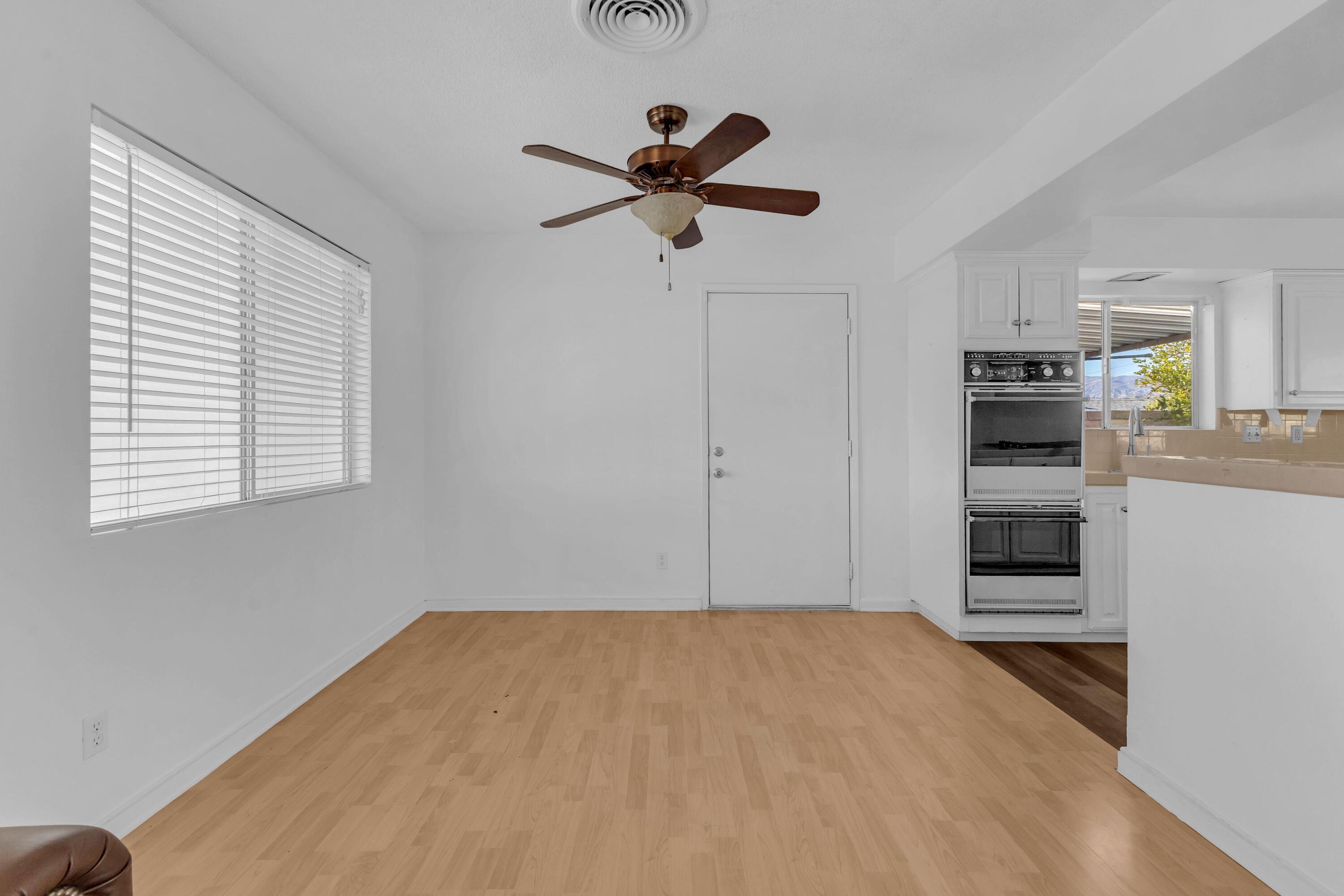 66180 14th Street Desert Hot Springs, CA 92240 - Photo 12 of 42 a view of a livingroom with a kitchen