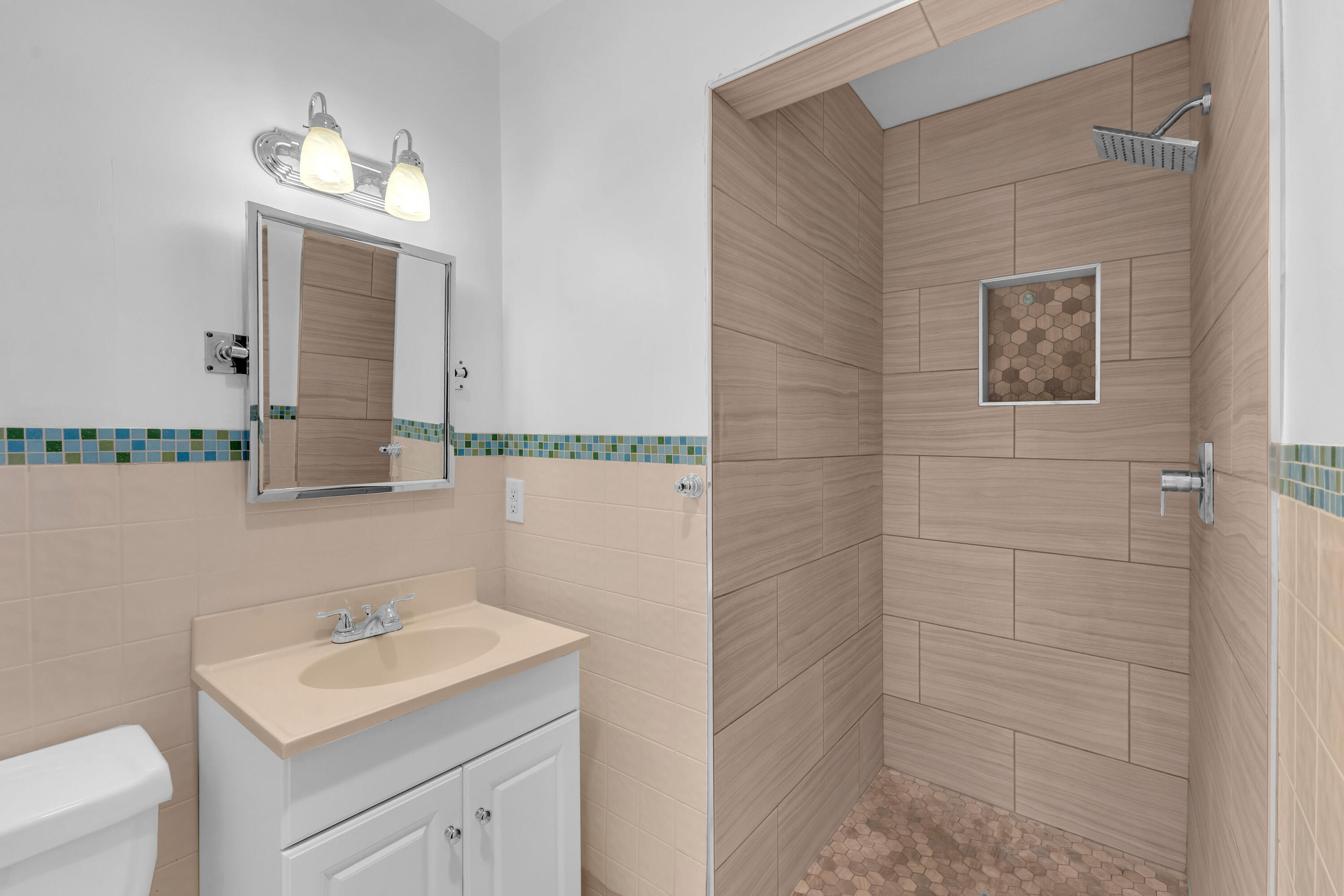 66180 14th Street Desert Hot Springs, CA 92240 - Photo 25 of 42 a bathroom with a sink toilet and mirror