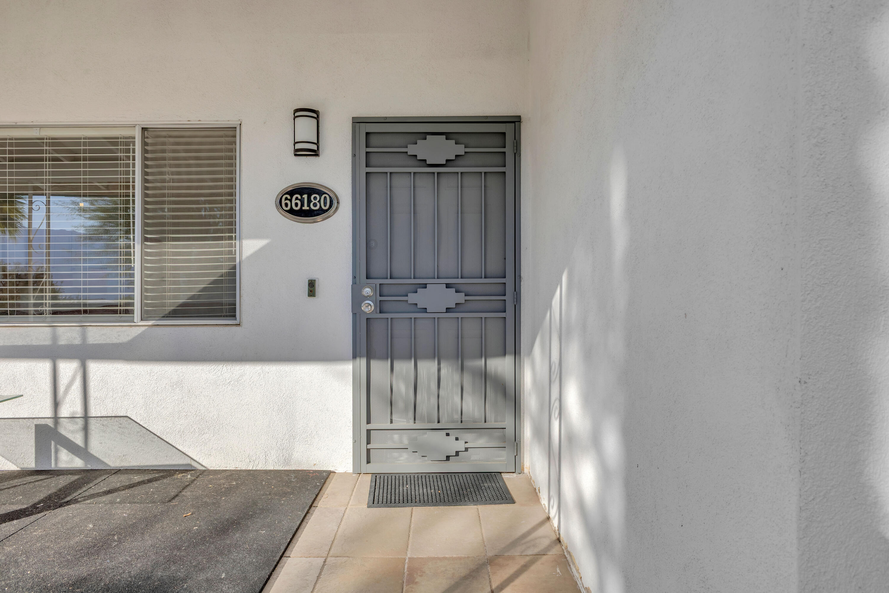66180 14th Street Desert Hot Springs, CA 92240 - Photo 6 of 42 a view of a bathroom with a tub and shower